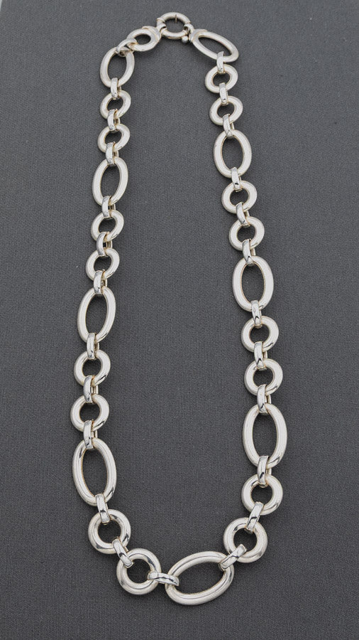 Sterling silver circle and oval chain with a signoretti clasp. 55cm