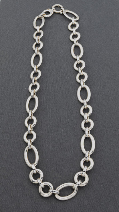 Sterling silver circle and oval chain with a signoretti clasp. 55cm