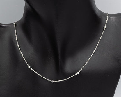 Sterling silver singapore chain with 2.5 mm silver balls.