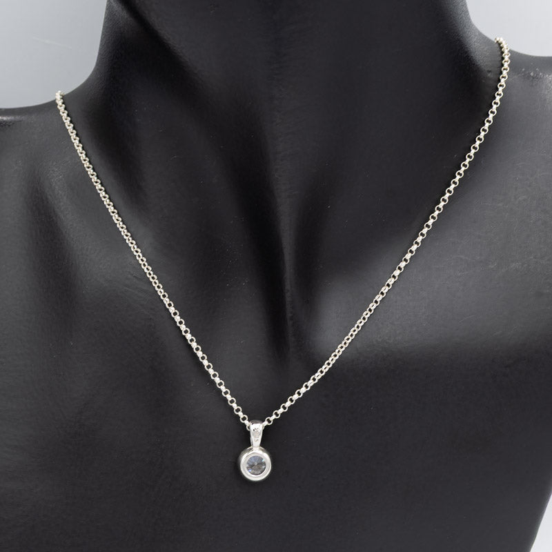 Sterling silver chain with a cubic pendant