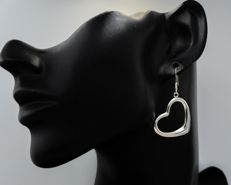 Silver heart dangling earrings