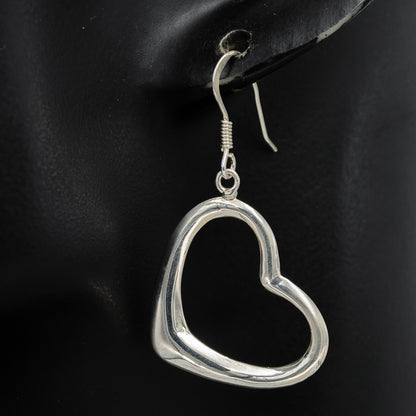 Silver heart dangling earrings