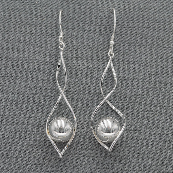 sterling silver twisted wire with a ball earrings