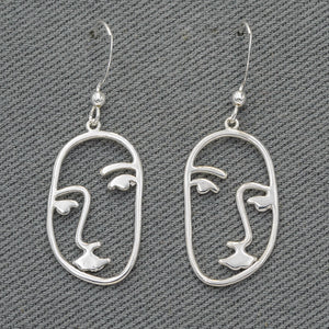 Sterling silver face earrings