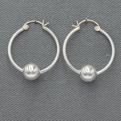 Sterling silver hoop with a ball med