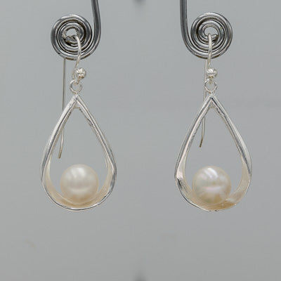Sterling silver pear shaped danglers with a pearl