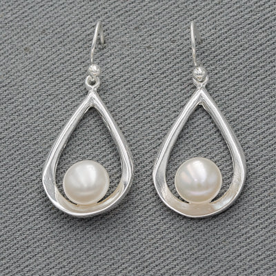 Sterling silver pear shaped danglers with a pearl