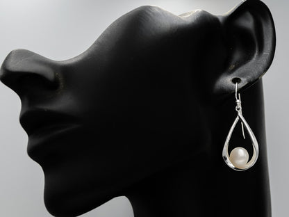 Sterling silver pear shaped danglers with a pearl