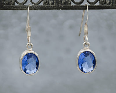 Sterling silver blue cubic oval drop earrings