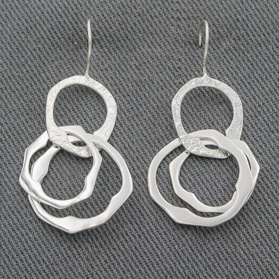 Sterling silver irregular circle earrings
