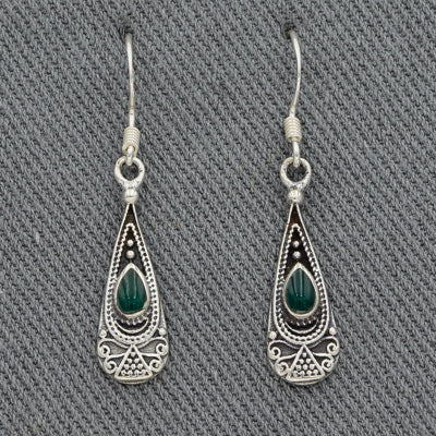 A sterling silver drop earring with a stone