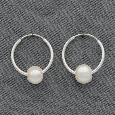 Sterling silver sleeper hoops with freshwater pearls