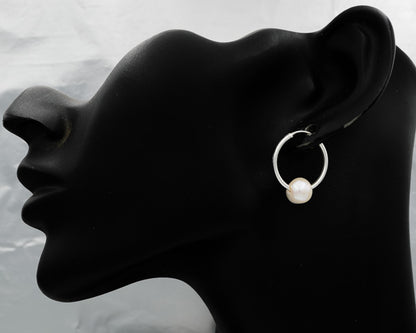 Sterling silver with a freshwater pearl