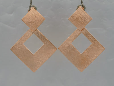 Rose gold square on a square earring