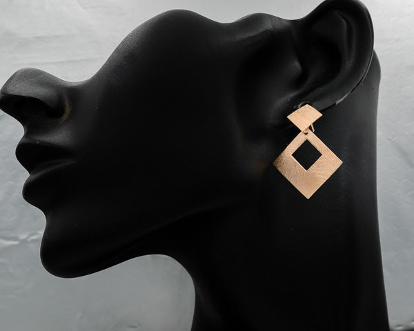 Rose gold square on a square earring