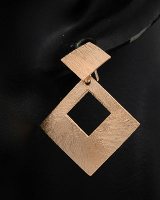 Rose gold square on a square earring