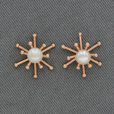 Freshwater pearl set in rose gold spike earrings