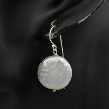 Button pearl earring