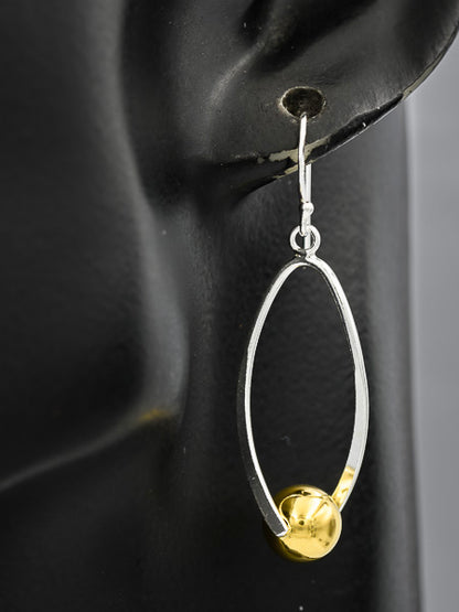 Sterling silver loop with a gold plated ball