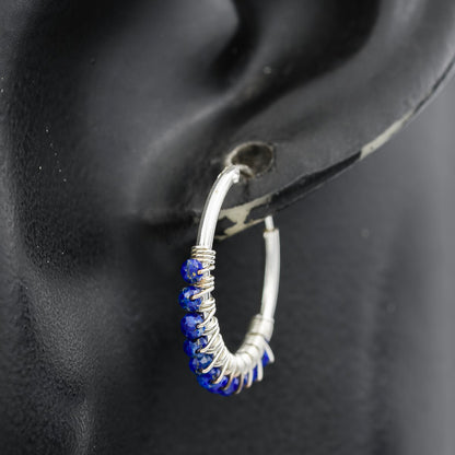 Sterling silver sleeper with Iolite stones
