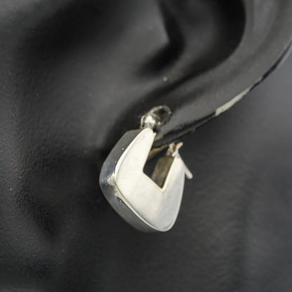 Sterling silver box hoops.