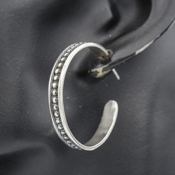 Sterling silver dotted hoops