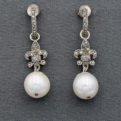 Sterling silver with Marcasites and a 12 mm pearl