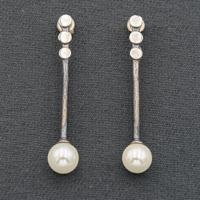 Oxidized silver bar with a shell pearl