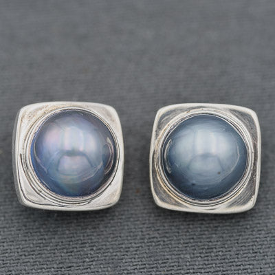 Blue Mabe' set in a square silver setting
