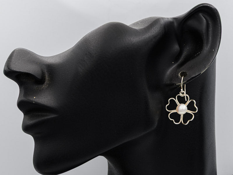 Sterling wired flower with a pearl earring