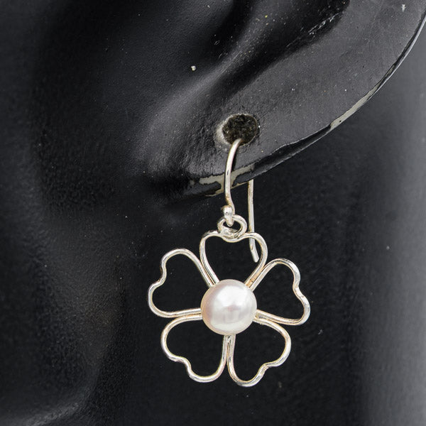 Sterling wired flower with a pearl earring