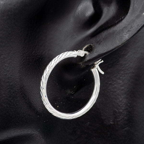 Textured sterling silver hoops