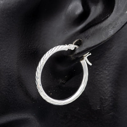Textured sterling silver hoops