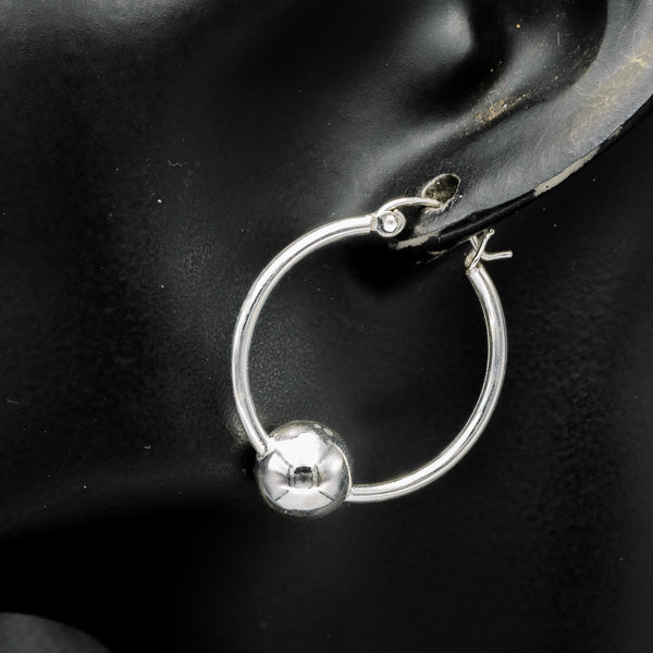 Sterling silver hoop with a ball med