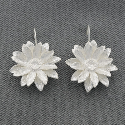 Sterling silver daisy drop earrings