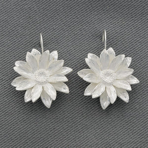 Sterling silver daisy drop earrings