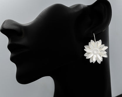 Sterling silver daisy drop earrings