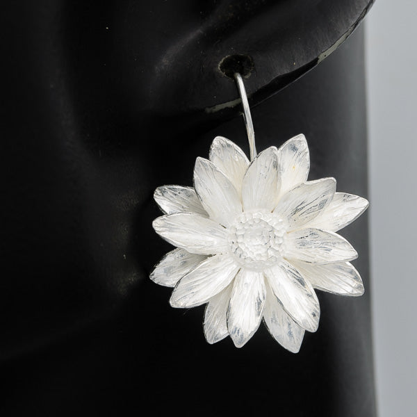 Sterling silver daisy drop earrings