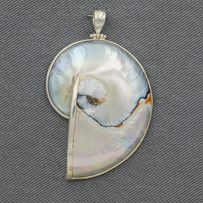 Shell pendant set in sterling silver