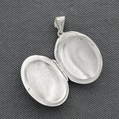 Sterling silver engraved oval locket