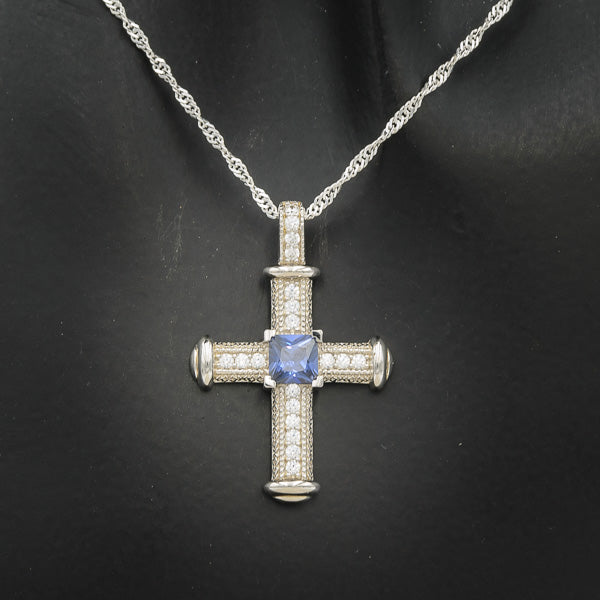 Sterling silver cross in pave with a square blue cubic