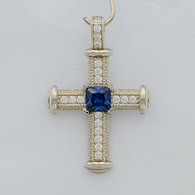 Sterling silver cross in pave with a square blue cubic