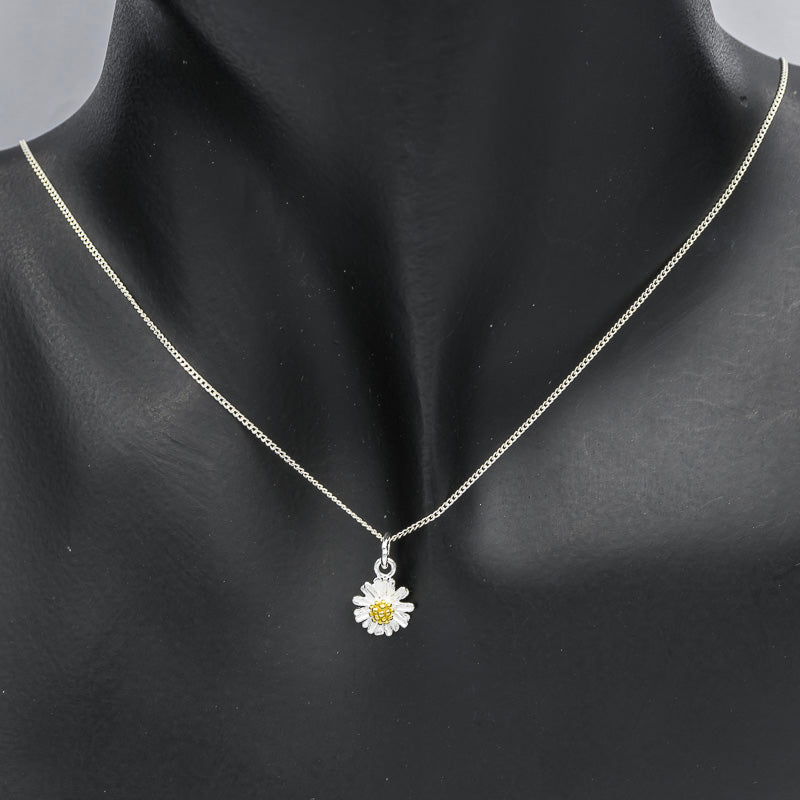 Sterling silver daisy pendant with gold plated pollen