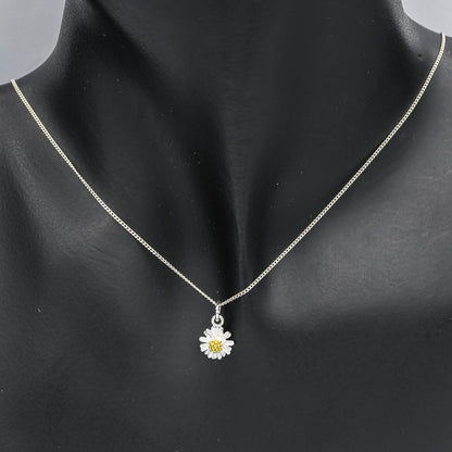 Sterling silver daisy pendant with gold plated pollen
