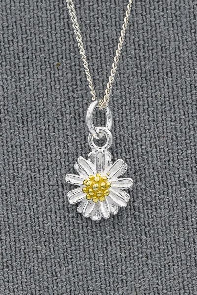 Sterling silver daisy pendant with gold plated pollen