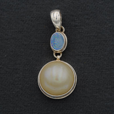 Blue opal and white mabe' pendant set in silver