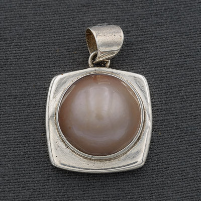 Sterling silver square with a dusty pink mabe'