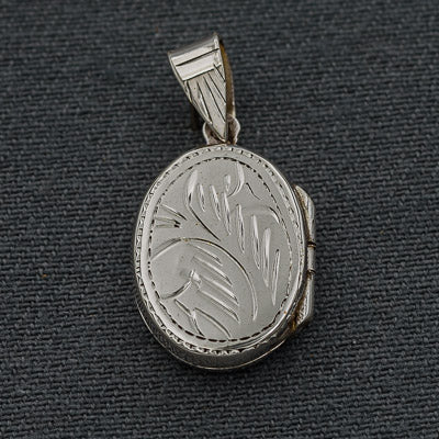 Sterling silver flat oval locket