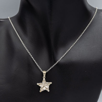 Sterling silver double daisy pendant
