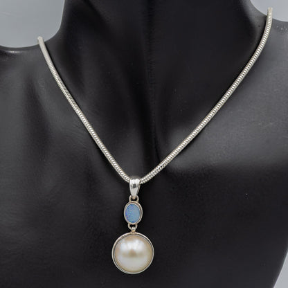 Blue opal and white mabe' pendant set in silver